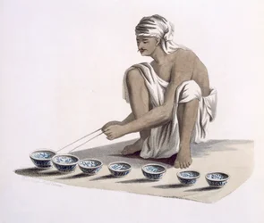 Jultrung: tocando en tazas de porcelana de diferentes tamaños para producir un sonido similar a una armónica, de 